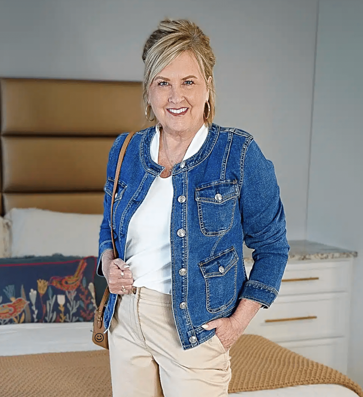 Tania Stephens wearing a denim collarless jacket